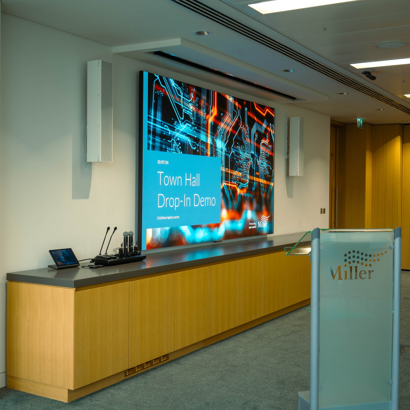 Upgraded town hall meeting room at Miller Insurance HQ by AVITdirect