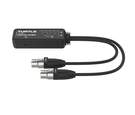 Turtle audio-adapter met dubbele XLR-kabels op een witte achtergrond